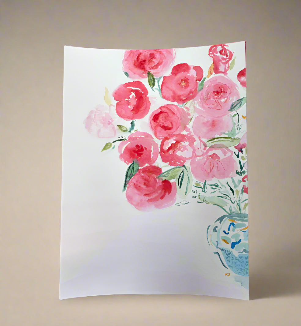 Floral painting on a stand against a beige wall